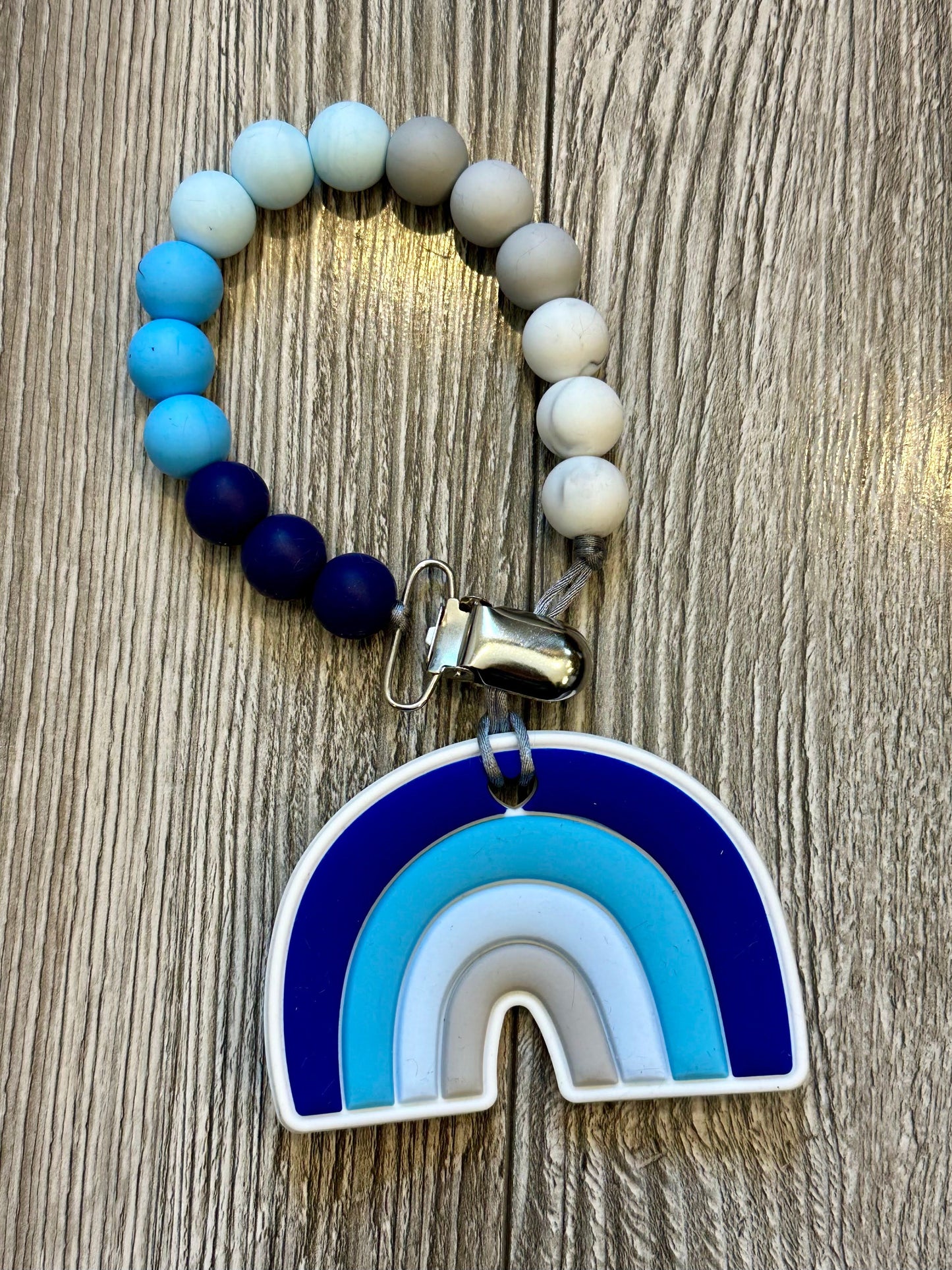 Soother Clip with Blue Rainbow Teether